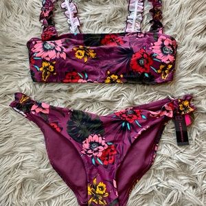 Women’s purple/floral bikini. NEVER WORN!
